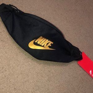 nike belt bag black and gold